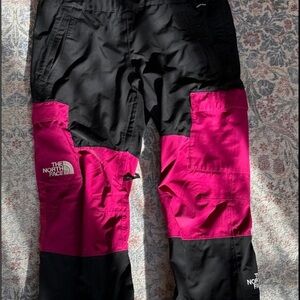 The North Face Women's Black and Magenta Freedom Snowbibs